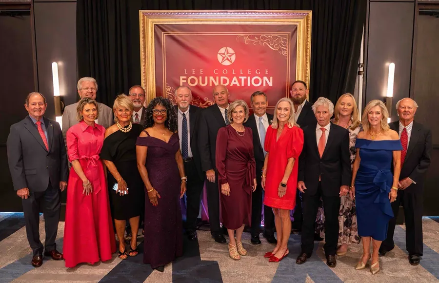 The Foundation board in evening attire in a posed arrangement